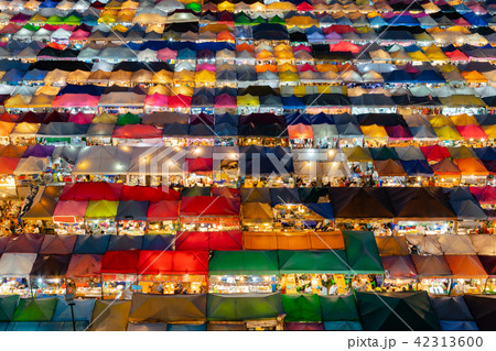 Aerial view multiple colour roof top flea market 42313600