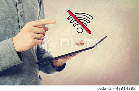 No WiFi theme with man holding a tablet 42314395