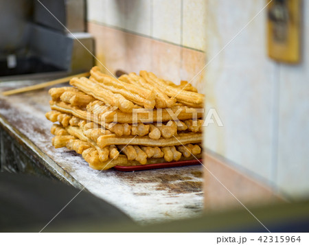 Youtiao, deep-fried dough stick Youtiao, deep-fried dough stick 42315964