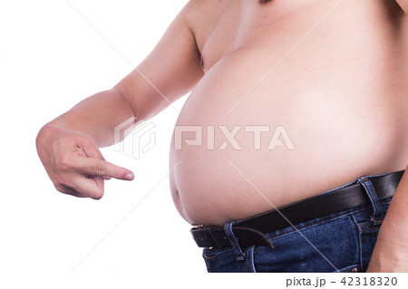 Man pointing own unhealthy big belly with fats Man pointing own unhealthy big belly with fats 42318320
