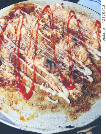 creperie is cooking Charcoal Crepe  42320712