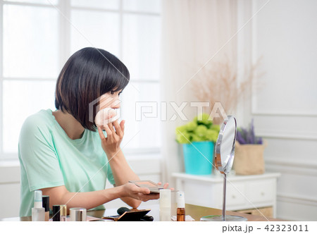 woman with makeup cosmetics woman with makeup cosmetics 42323011