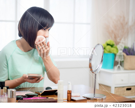 woman with makeup cosmetics woman with makeup cosmetics 42323018