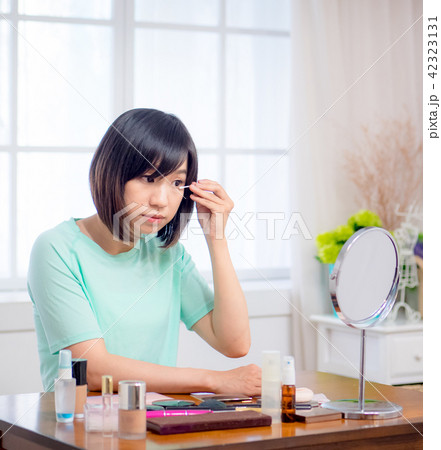 woman with makeup cosmetics woman with makeup cosmetics 42323131