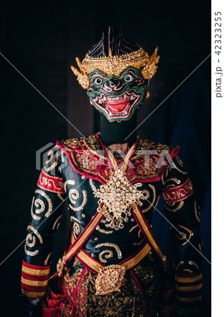 Traditional Thai puppet elegant costume on dark 42323255