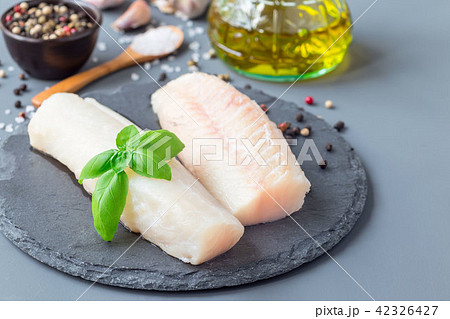 Fresh raw cod fillet with spices 42326427