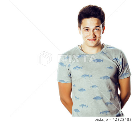 young handsome teenage hipster guy posing emotional, happy smili 42328482