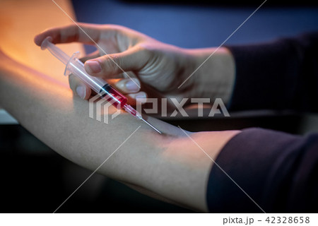 Junkie man injecting drug dose. Drug addiction 42328658