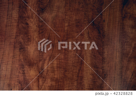 Brown dark scratched wooden cutting, board.  Brown dark scratched wooden cutting, board.  42328828