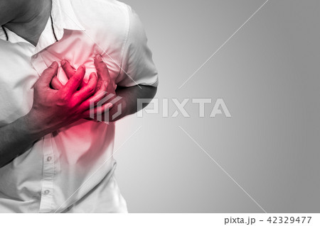 Man having chest pain 42329477