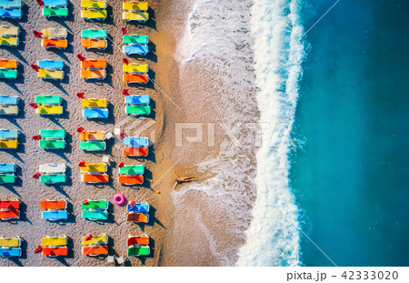 Aerial view of lying woman on the beach Aerial view of lying woman on the beach 42333020