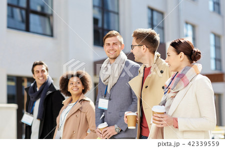 office workers with coffee on city street 42339559