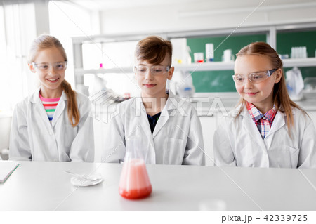 kids with test tube studying chemistry at school kids with test tube studying chemistry at school 42339725