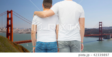 male couple with gay pride rainbow wristbands male couple with gay pride rainbow wristbands 42339897