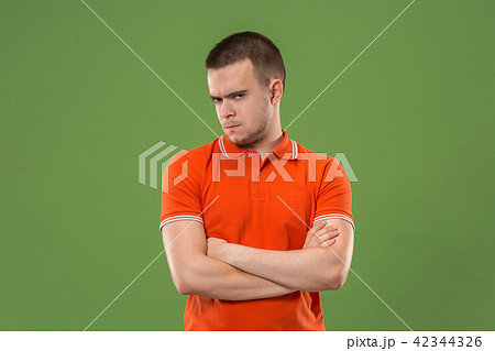 Suspiciont. Doubtful pensive man with thoughtful expression making choice 42344326