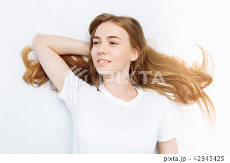 Beautiful girl lying down Beautiful girl lying down 42345425