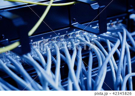 Network panel, switch and cable in data center Network panel, switch and cable in data center 42345826