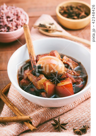 Eggs and pork in brown sauce,Thai Cuisine. 42348426