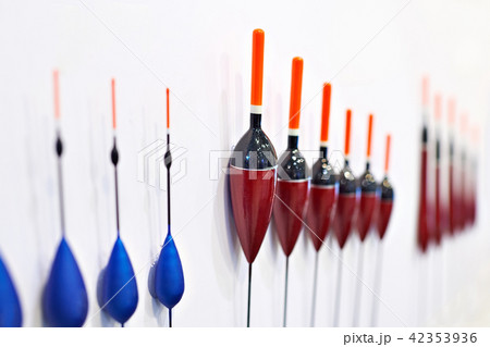 Fishing floats on white wall 42353936
