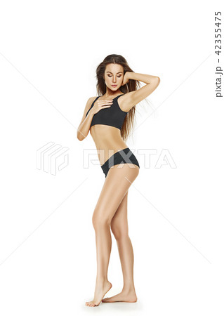 Fit, healthy and sporty girl in swimsuit. Sport, fitness, diet and healthcare concept. 42355475