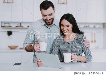 Young Couple Have Breakfast in Morning at Home. 42358121