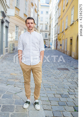Young man background the old european city take selfie Young man background the old european city take selfie 42362975