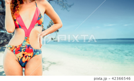 Happy young woman at beach in summer vacation. Happy young woman at beach in summer vacation. 42366546