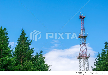 telecommunication tower with a parabolic antennas 42369950