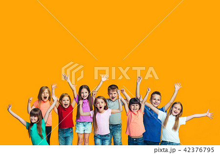 Happy success teensl celebrating being a winner. Dynamic energetic image of happy children Happy success teensl celebrating being a winner. Dynamic energetic image of happy children 42376795