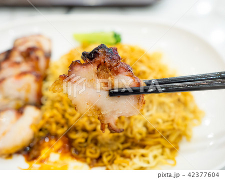 Egg noodle with roasted red pork 42377604