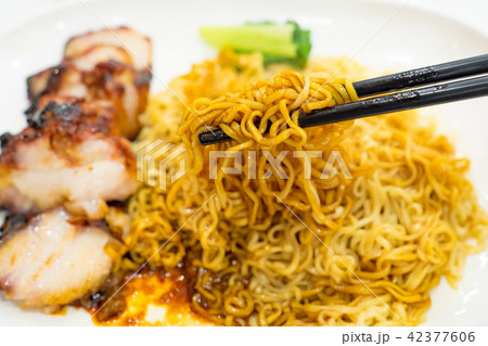 Egg noodle with roasted red pork 42377606