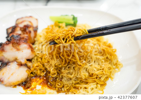 Egg noodle with roasted red pork Egg noodle with roasted red pork 42377607