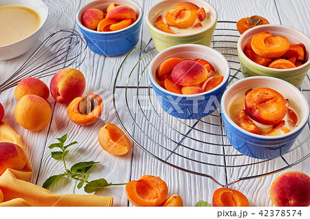 Ingredients for french dessert apricot clafoutis 42378574