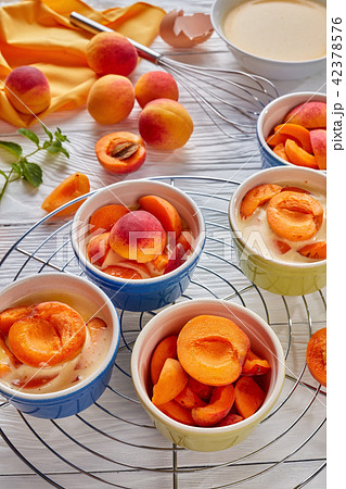 Ingredients for french dessert apricot clafoutis 42378576
