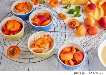 Ingredients for french dessert apricot clafoutis 42378577