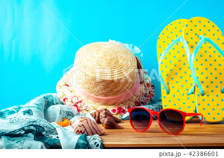 accessories for summer on wooden blue background accessories for summer on wooden blue background 42386601