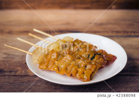 Thai styled pork babeque on wood backgrond 42388098