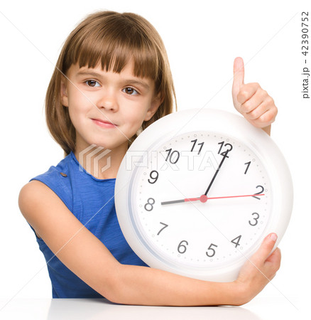 Little girl is holding big clock 42390752