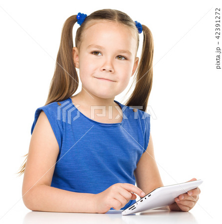 Young girl is using tablet 42391272