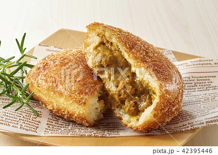 curry bread on wooden plate curry bread on wooden plate 42395446