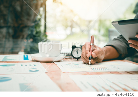Businessman writing make note on desk office 42404110