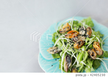 Yummy thai salad with mussels, light background with copyspace. 42405230