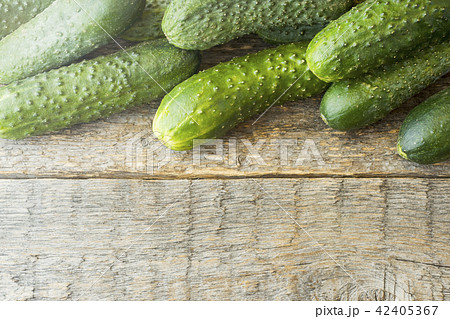 Fresh cucumbers on a wooden table. Rendered image, Fresh cucumbers on a wooden table. Rendered image, 42405367
