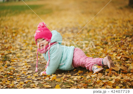 cute happy girl in autumn park cute happy girl in autumn park 42407719