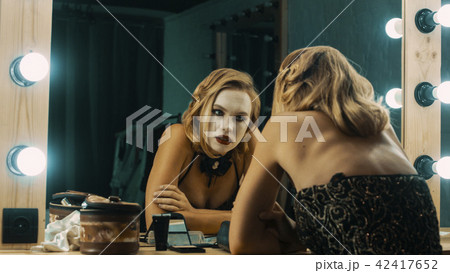 Depressed tired actress after show Depressed tired actress after show 42417652
