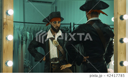 Man in pirate costume rehearsing scene 42417785