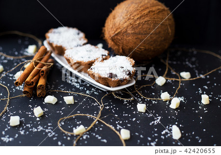 coconut muffins on a black background 42420655