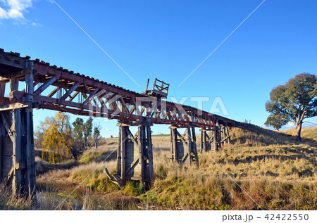 Old historic wooden railway bridge in rural NSW 42422550