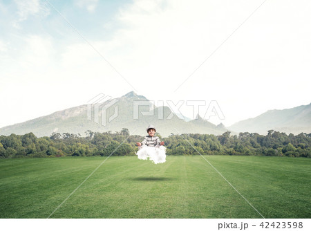 Young boy keeping mind conscious. 42423598