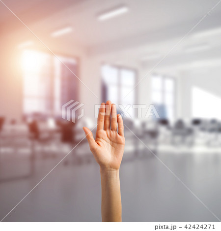 Choosing gesture of person in elegant modern interior in sunshine light Choosing gesture of person in elegant modern interior in sunshine light 42424271